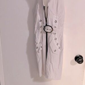 Mini white dress with a lot of silver designs